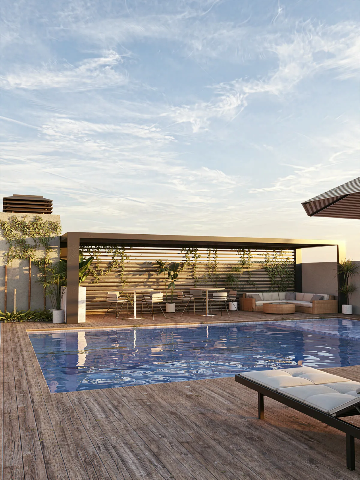 Terraza con pileta, deck de madera y pérgola al atardecer